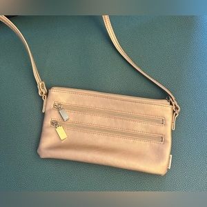 EUC taupe / golden color lightweight night out or travel bag. Cross body fit .